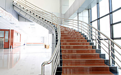 Guardrail-mounted handrail