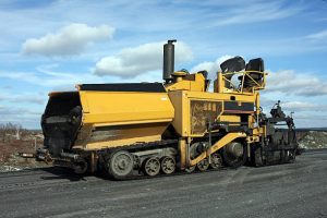 Construction equipment: asphalt pavers.